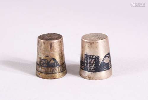 TWO 19TH CENTURY IRAQ SILVER & NIELLO INLAID THIMBLES, each ...