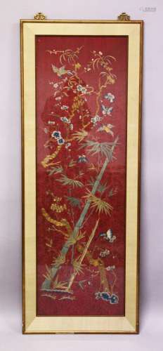 A LARGE CHINESE EMBROIDERED PANEL, depicting butterflies and...