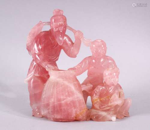 A GOOD CHINESE CARVED ROSE QUARTZ FISHERMAN GROUP, the fishe...