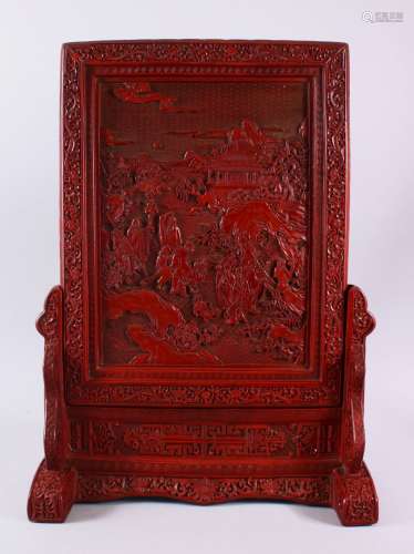 A CHINESE RELIEF CINNABAR LACQUER STYLE TABLE SCREEN & STAND...