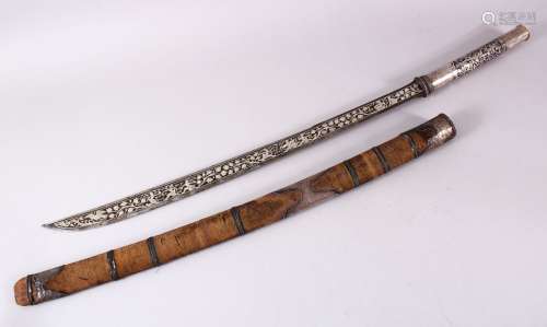 A FINE 19TH CENTURY BURMESE DHA SWORD with niello inlaid han...