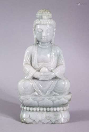 A CHINESE CARVED JADEITE FIGURE OF BUDDHA / DEITY, in a seat...