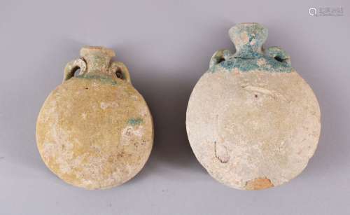 TWO 10TH CENTURY IRANAIN POTTERY TWIN HANDLE BOTTLES, each w...