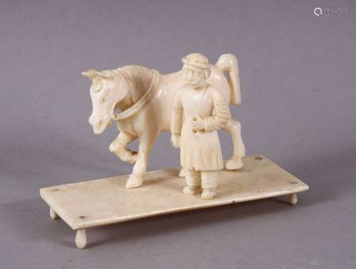 A SMALL 19TH CENTURY INDIAN SECTIONAL CARVED IVORY HORSE AND...