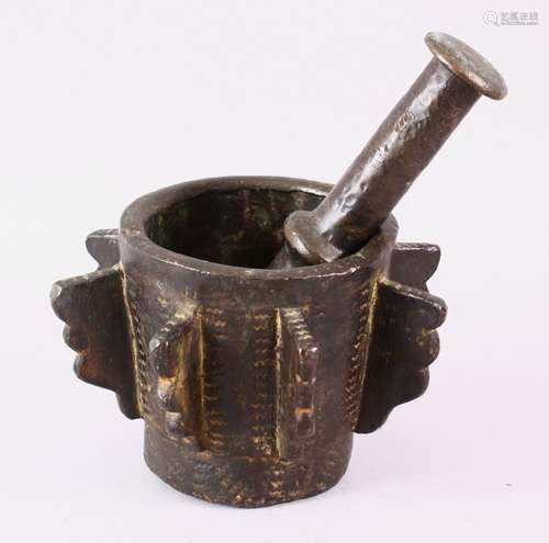 AN EARLY ISLAMIC HISPANO MORESQUE ANDALUSIAN BRONZE PESTLE A...