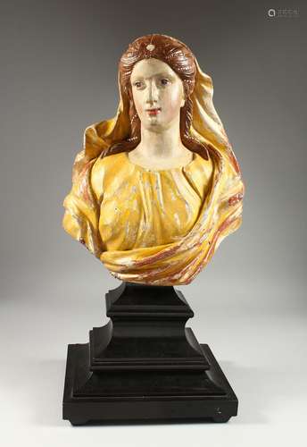 AN 18th CENTURY ITALIAN POLYCHROME BUST OF A YOUNG CHILD 16i...