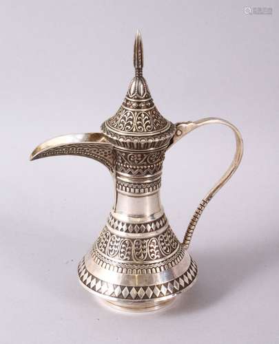 AN ISLAMIC OTTOMAN SILVER SILVER DALLAH COFFEE POT, decorate...