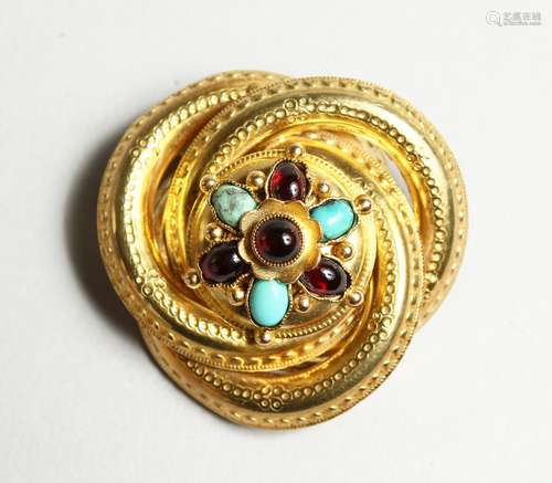 A VICTORIAN GOLD BROOCH set with opal and amethyst.