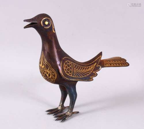 A PERSIAN QAJAR GOLD DAMASCENED IRON MODEL OF A BIRD, 15.5cm...