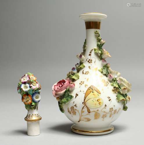 A ROCKINGHAM FLOWER ENCRUSTED SCENT BOTTLE, griffin mark in ...