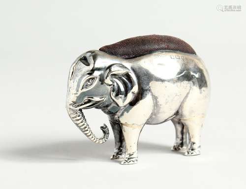 AN 18CT BIRMINGHAM SILVER ELEPHANT PIN CUSHION 2.5ins long