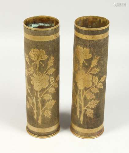 TRENCH ART, A GOOD PAIR OF BRASS SHELL CASES engraved with f...