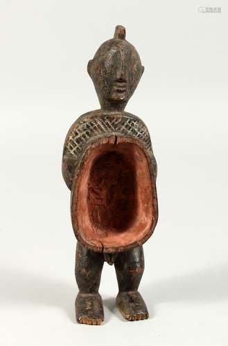 AN ANCIENT TRIBAL CARVED WOOD FIGURE 9ins high