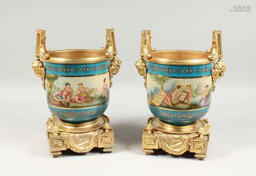 A GOOD PAIR OF SEVRES PORCELAIN AND ORMOLU TWO HANDLED CACHE...