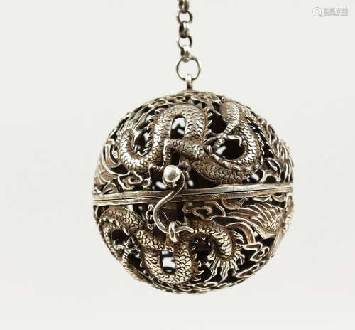 A CHINESE PIERCED BALL CENSER on a chain. 2ins diameter.