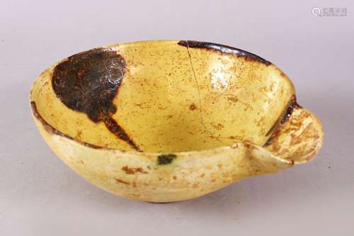 A GOOD IRAN STYLE POTTERY POURING BOWL, decorated with a yel...