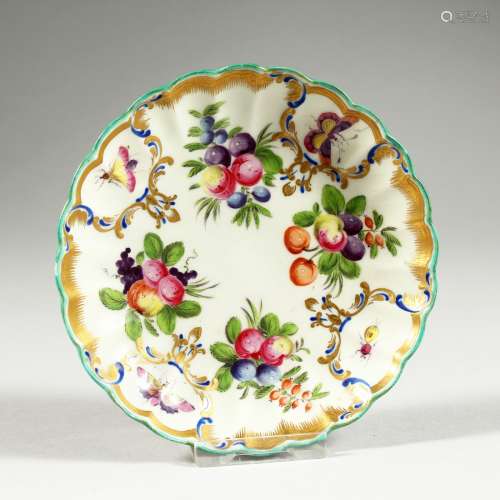 A WORCESTER SAUCER PAINTED WITH FRUIT AND INSECTS, in the st...