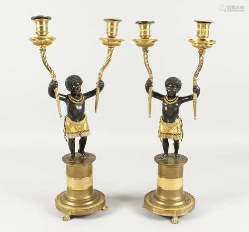 A SUPERB PAIR OF EMPIRE BRONZE AND GILT BRONZE TWO BRANCH CA...