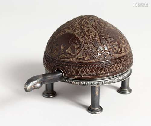 A RARE COCONUT CASED TORTOISE SHAPED CLOCK, the movement by ...