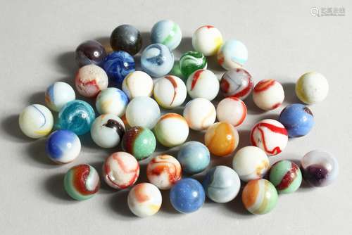 A COLLECTION OF FORTY VARIOUS COLOURED MARBLES 1-1.5cm.