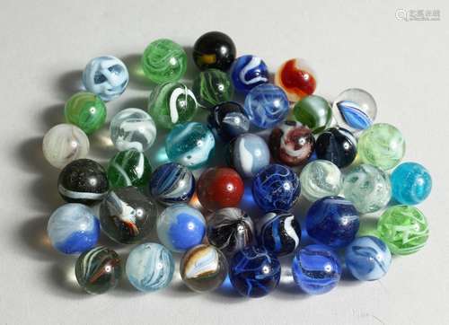 A COLLECTION OF FORTY VARIOUS COLOURED MARBLES 1-1.5cm.