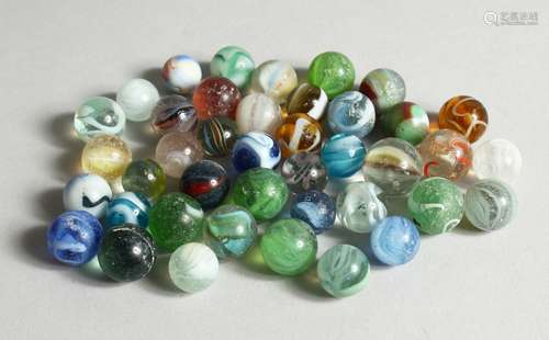 A COLLECTION OF FORTY VARIOUS COLOURED MARBLES 1-1.5cm.