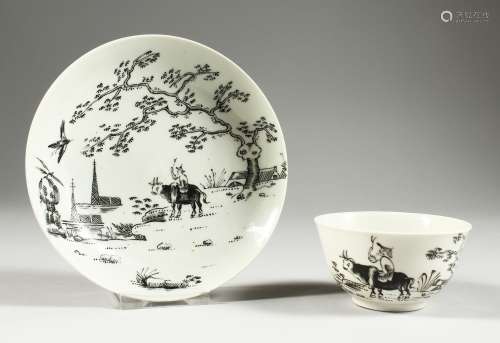 A WORCESTER TEABOWL AND SAUCER pencilled with the Boy on a B...
