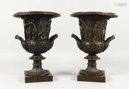 A GOOD PAIR OF CLASSICAL TWO HANDLED CAMPAGNAS URNS on squar...