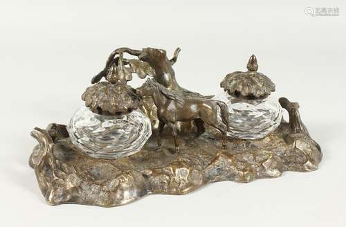 A GOOD BRONZE INKWELL, girl with a horse in a rustic setting...