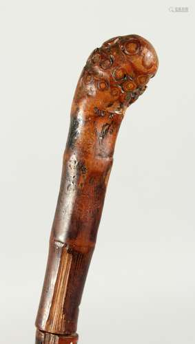 A VICTORIAN BLACKTHORN SWORD STICK with a briar handle.