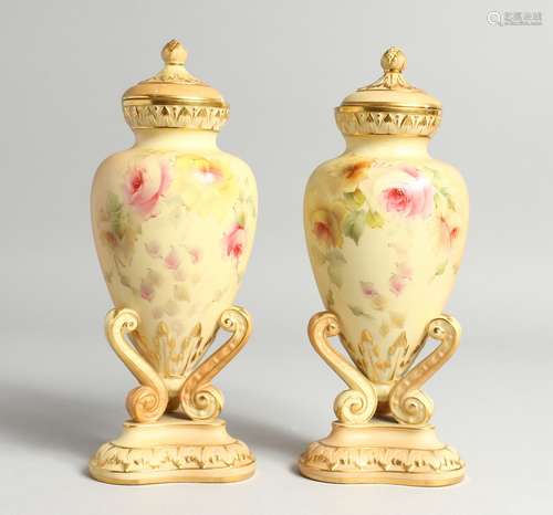 A PAIR OF GRAINGER &CO. ROYAL WORCESTER BLUSH IVORY URNS AND...