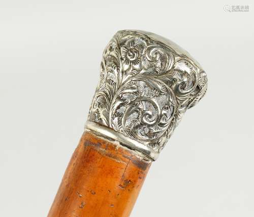 A VICTORIAN CANE with silver handle. Sheffield, 1890. 34ins ...