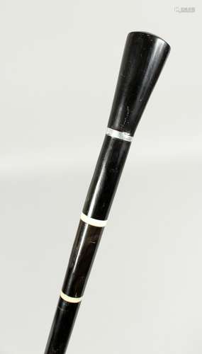 A VICTORIAN EBONY AND IVORY CANE 35ins long.