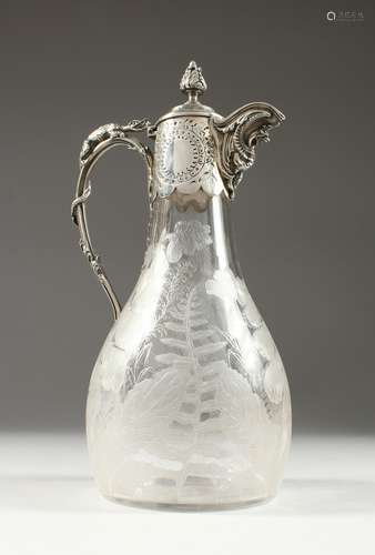 A VICTORIAN ETCHED GLASS CLARET JUG with plated mounts