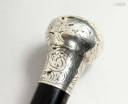 A VICTORIAN CANE with silver handle. Birmingham, 1871 35ins ...