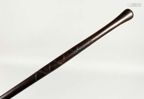 A HARDWOOD CANE 36ins long.