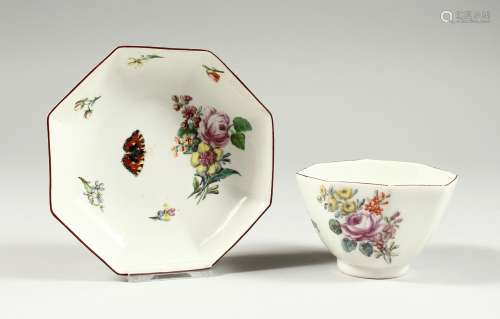 A CHELSEA OCTANGONAL TEABOWL AND SAUCER, painted with flower...