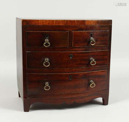 AN APPRENTICE GEORGIAN MAHOGANY BOWFRONT CHEST with beaded t...