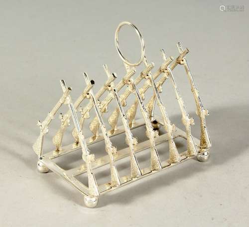 A SILVER PLATE TOAST RACK, CROSS RIFLES