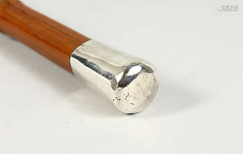 A VICTORIAN BAMBOO CANE with plain silver handle. 37ins long...