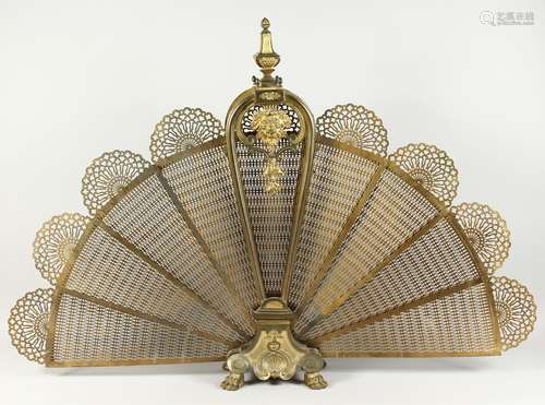 A VERY GOOD FRENCH ORMOLU PIERCED FAN SHAPED FIREGUARD, with...