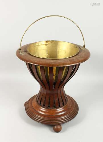 A DUTCH MAHOGANY JARDINIERE with brass liner. 1ft 4ins high