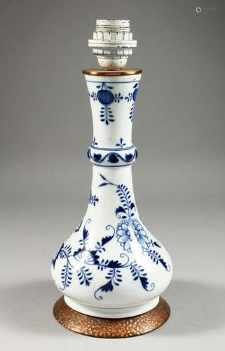 A MEISSEN PORCELAIN BLUE AND WHITE LAMP of the onion pattern...