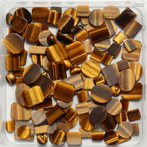 A BOX OF TIGERS EYE STONES