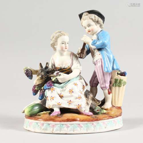 A 19TH CENTURY MEISSEN STYLE PORCELAIN GROUP OF A BOY AND GI...