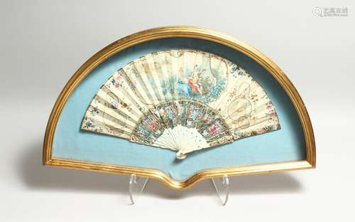 AN 18TH CENTURY FRENCH IVORY AND PAPER FAN, with young lover...