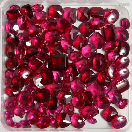 A BOX OF RUBY BUFF STONES.