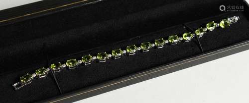 A PERIDOT SET LINE BRACELET