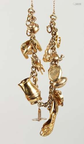 A 9CT. GOLD CHARM BRACELET