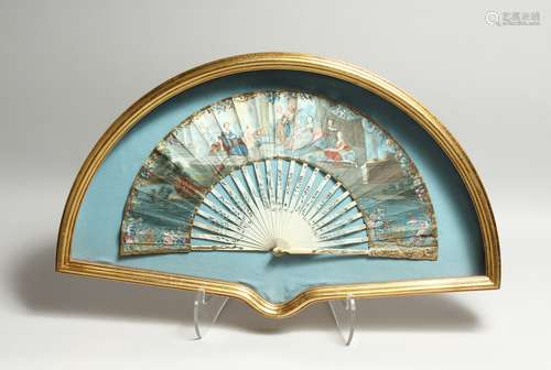 AN 18TH CENTURY FRENCH IVORY AND PAPER FAN, with classical f...